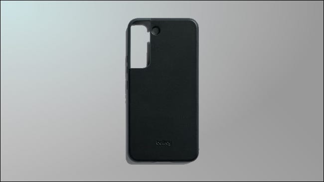 black Bellroy case on grey background