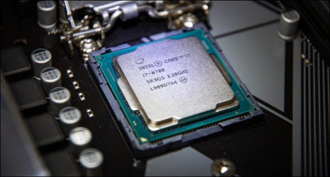 Intel Core i7-8700 CPU attached to a motherboard.