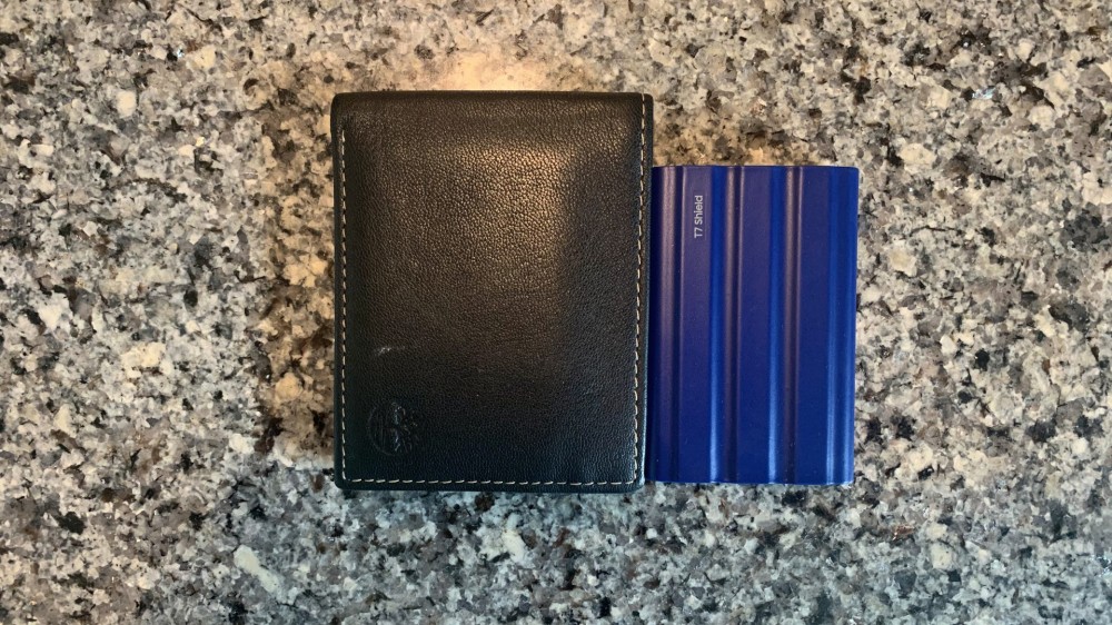 T7 Shield SSD next to wallet