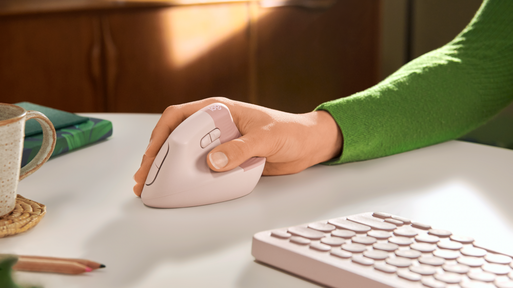 A hand wrapped around a vertical mouse