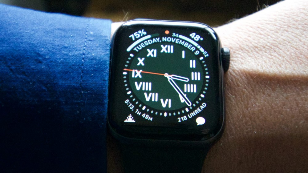 A man wearing a Series 5 Apple Watch